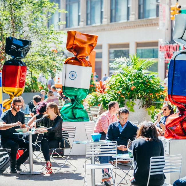 Brightly-colored, over-sized sculptures of wrapped candies